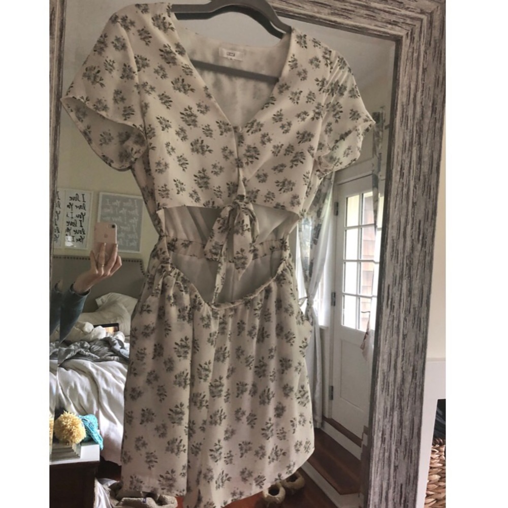 Lucca Romper floral pattern lightweight fabric.